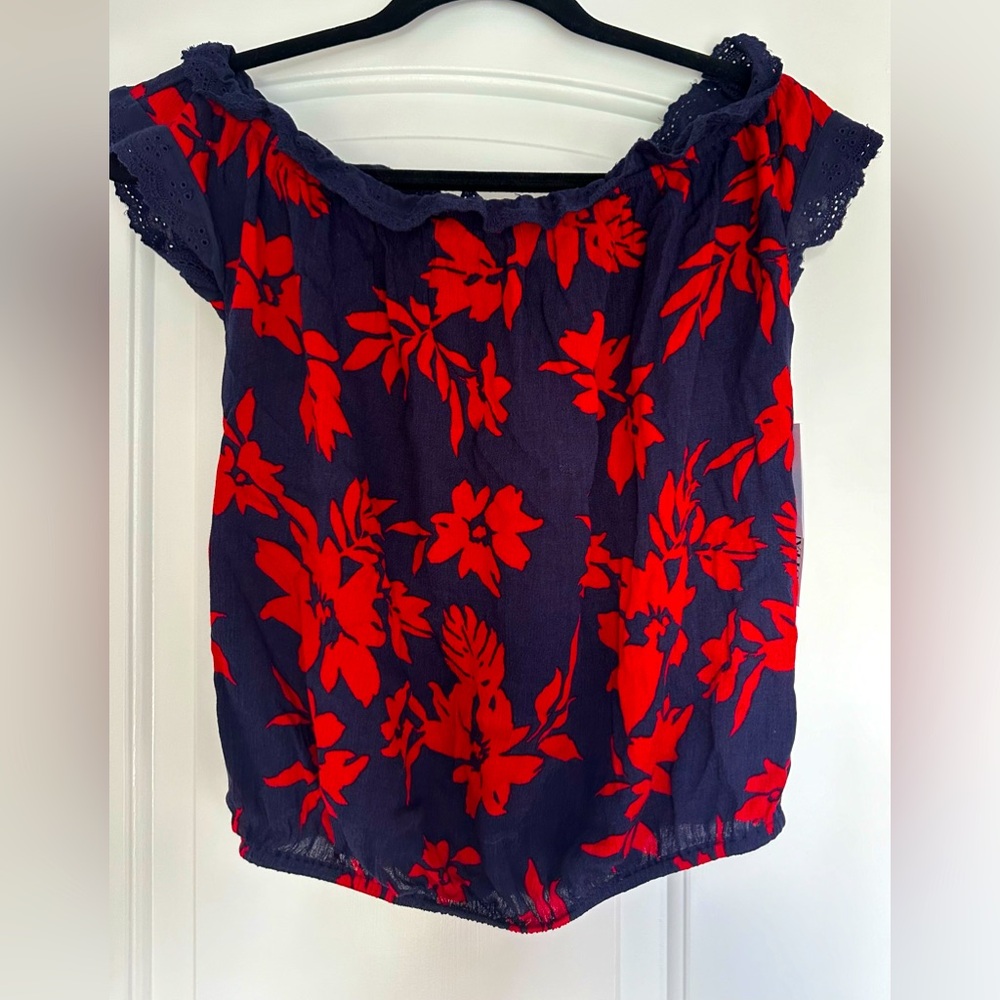 Navy and Red Floral top. Elastic bottom.